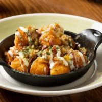 Loaded Tots · Cheddar tots smothered with melted mozzarella and provolone cheeses, applewood smoked bacon ...