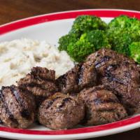 Broiled Sirloin Tips* · Our signature tips, hand-cut and marinated with our secret recipe. Served with two sides.