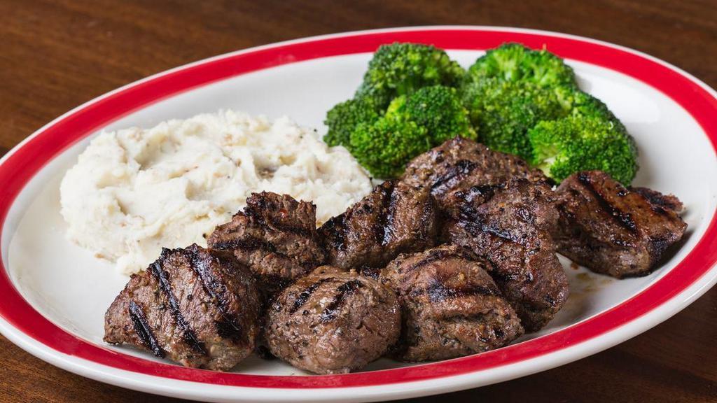 Broiled Sirloin Tips* · Our signature tips, hand-cut and marinated with our secret recipe. Served with two sides.