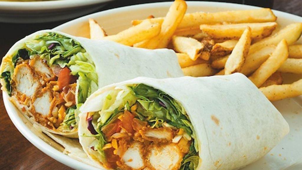 Honey Bbq Chicken Wrap · Hand-breaded crispy chicken tenders drenched in honey BBQ sauce. Wrapped up with lettuce, tomatoes, Monterey Jack and cheddar cheeses. Served with choice of one side.