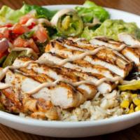 Southwest Fajita Chicken Bowl · South of the border style with sautéed onions and peppers, crisp romaine, corn, black beans,...