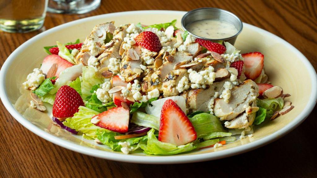 Strawberry Chicken Salad · Fresh mixed greens with grilled chicken, fresh, ripe strawberries, bleu cheese crumbles and sliced almonds. Served with creamy poppyseed dressing.