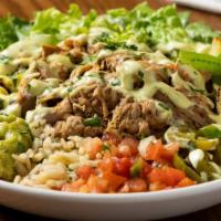 Southwest Fajita Carnitas Bowl · South of the border style with sautéed onions and peppers, crisp romaine, corn, black beans,...