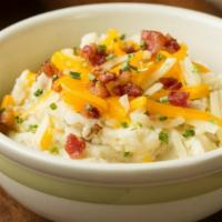 Loaded Mashed Potatoes · Topped with cheese, bacon & chives.