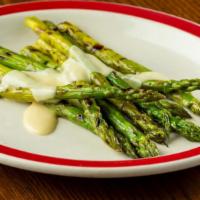 Grilled Dijon Asparagus · Fresh grilled asparagus topped with Dijon cream sauce.