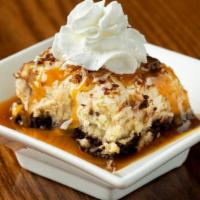 Banana Coconut Caramel Petite Treat · A chocolate cookie crust topped with banana cream, toasted coconut and chocolate drizzle. Fi...