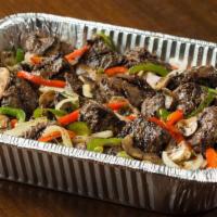 Smothered Tips* · Our signature Broiled Sirloin Tips smothered with fresh sauteed onions, peppers and mushrooms.