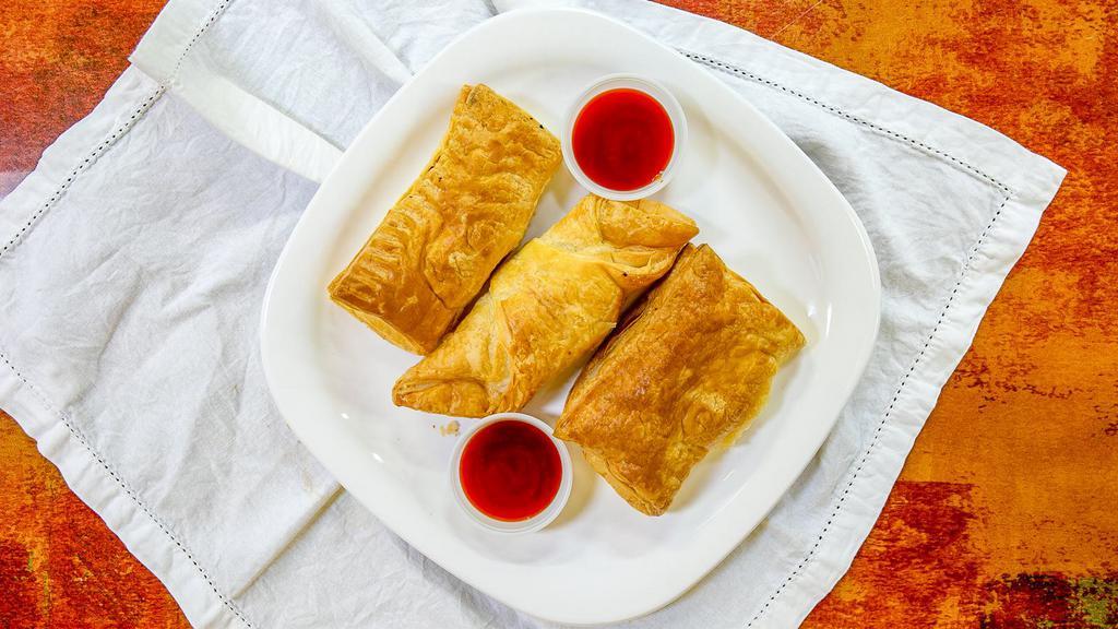 Veg Puff · Cooked vegetables stuffed in flaky pastry sheets.