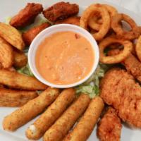 Fried Mixed Sampler · Chicken fingers, mozzarella sticks, potato wedges, hot wings and onion rings.