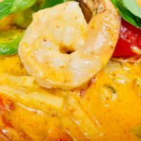 Red Curry · Bamboo shoot, bell pepper, and Thai basil in red curry coconut cream.