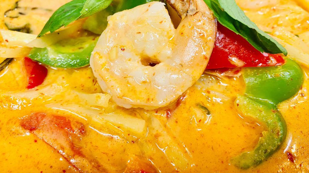 Red Curry · Bamboo shoot, bell pepper, and Thai basil in red curry coconut cream.