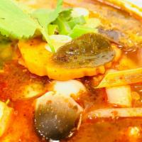 Tom Yum Soup · Savoury, spicy and sour soup with lemongrass, kaffir lime, mushroom, baby corn, onion and to...