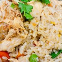 Thai Fried Rice · Classic fried rice with tomato, peas, onion, scallion, carrot, and egg.