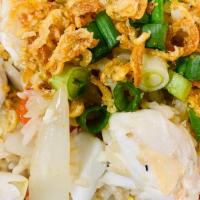 Crab Fried Rice · The king of Thai fried rice. Real lump crabmeat, garlic, onion, scallion, and egg.