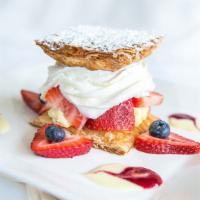 Napoleon · Puff pastry, strawberries, whipped cream and pastry cream.