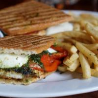 Chicken Sandwich · Fresh mozzarella, roasted red peppers, pesto on baguette