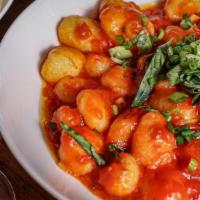 Gnocchi · Pomodoro sauce, scallions, basil, parmesan