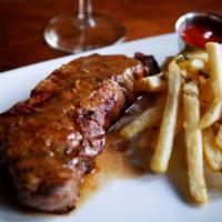 Ny Strip Steak · 12 Oz grilled Angus steak served with French fries, red wine sauce