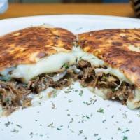 Shredded Beef Crêpe · Perfectly seasoned shredded beef with onions, and snack-mix cheese. Served with your choice ...