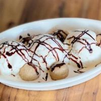 Icecream With Churros · Vanilla or chocolate ice cream with your choice of churros.