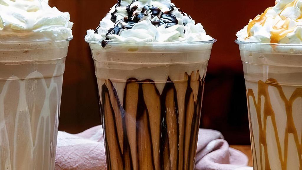 Frappé · A tasty and refreshing icy blended coffee. Vanilla, Caramel or Chocolate flavored.