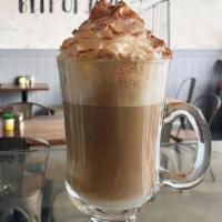 Cappuccino · An espresso-based coffee drink prepared with steamed milk foam, topped with whipped cream an...