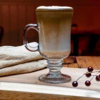 Paçoca Latté · An espresso-based peanut infused coffee drink prepared with steamed milk foam, topped with p...