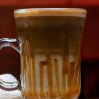 Caramel Latté · An espresso-based caramel infused coffee drink prepared with steamed milk foam, topped with ...