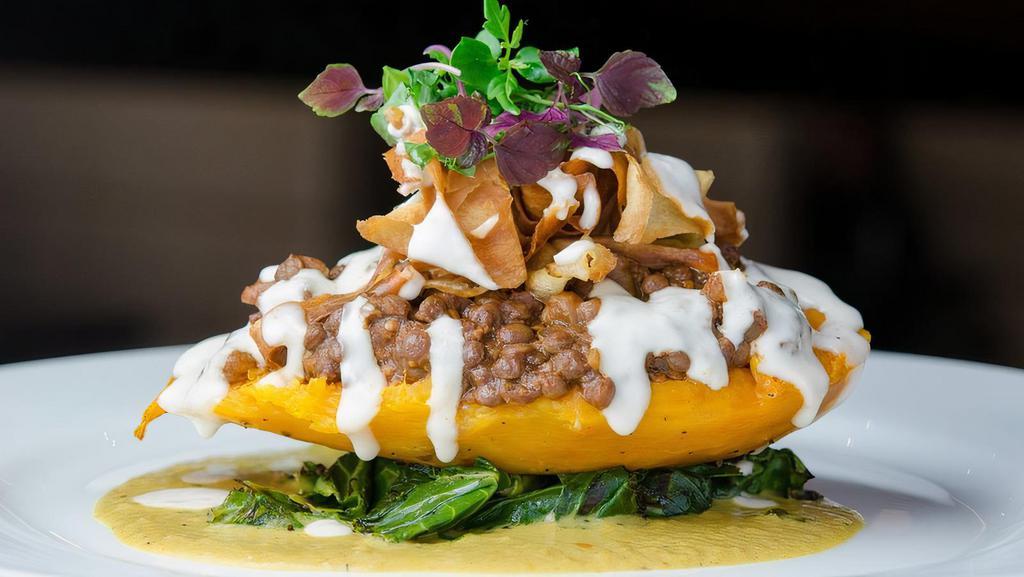 Curried Stuffed Sweet Potato (Dinner Only) · walnut-lentil-eggplant stuffing, coconut peanut curry, grilled collard greens, parsnip chips, horseradish crème (gluten-free, soy-free)