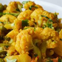 Aloo Gobi · Cauliflower and potatoes cooked with herbs and spices.