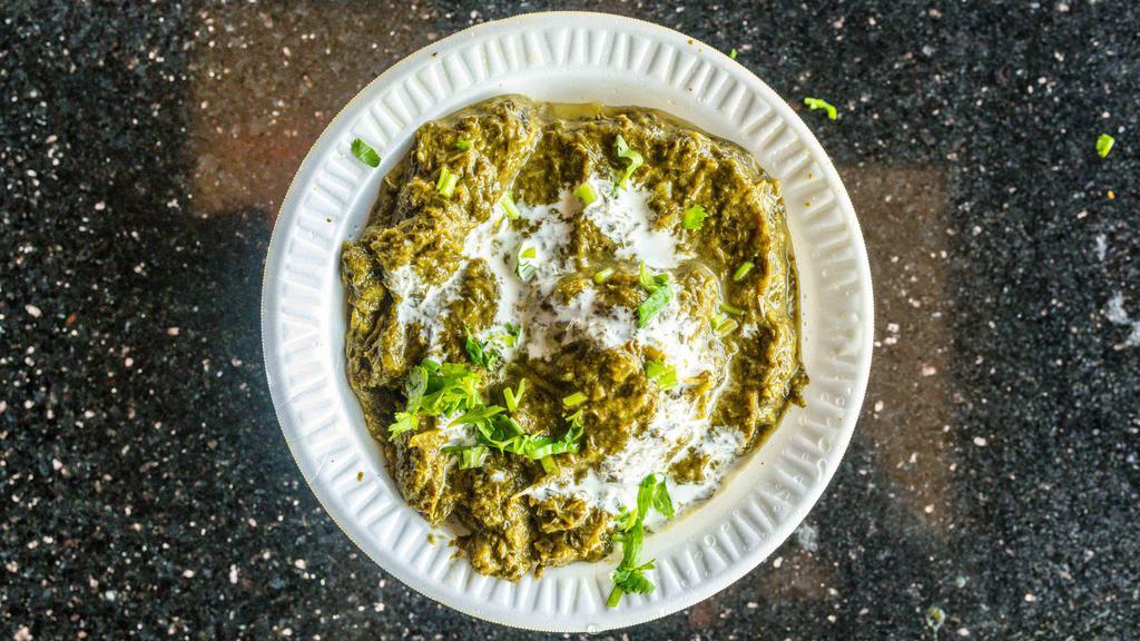Saag · Spinach and mustard cooked with herbs and spices.