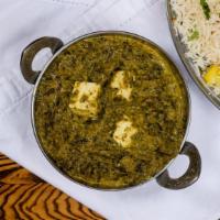 Saag Paneer · Homemade cheese and spinach, sautéed with touch of cream.