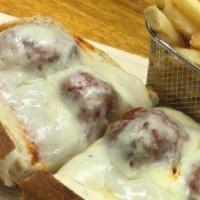 Meatball Parmesan Sandwich · Our homemade meatballs are unbeaten if you think otherwise just give it a try.