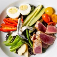 Niçoise Salade · Grilled tuna steak, bib butter lettuce, hard boiled eggs, anchovies, haricots vert, grilled ...