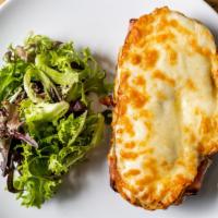 Croque Monsieur Sandwich · Lightly toasted pain de mie, bechamel, artisanal grated cheese blend and ham served crispy a...