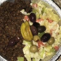 Mujadara Platter · Combination of lentil and wheat, yogurt sauce and Cabbage salad.