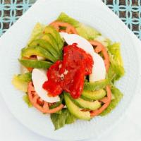 Nick Salad · Avocado, fresh mozzarella, tomato and roasted peppers.
