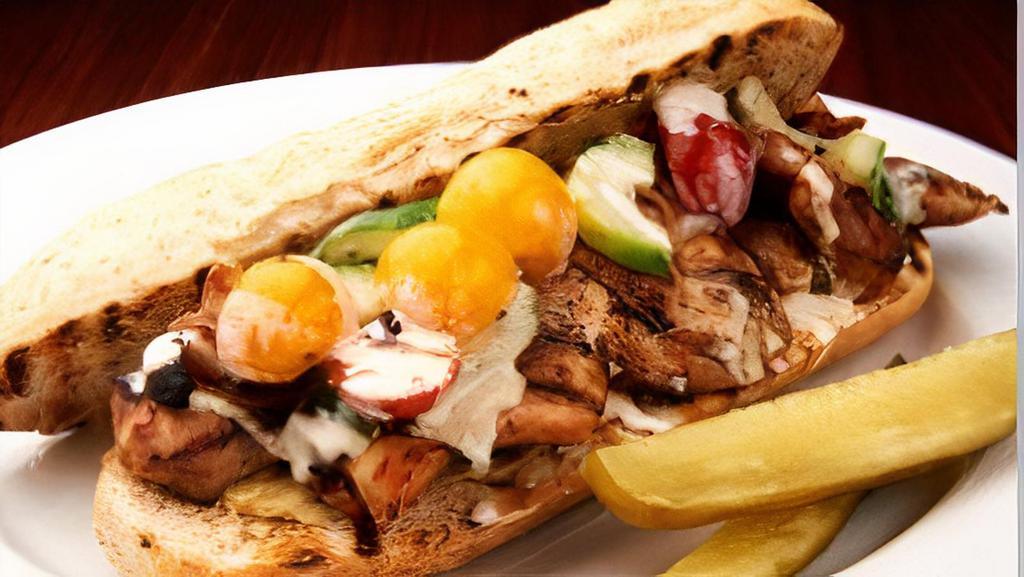 Baby Chicken · Served on a baguette. Served with lettuce, tomato, onion, pickles and your choice of sauce.