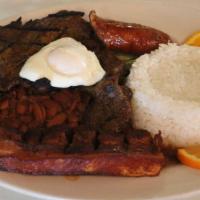 Colombian Typical Dish · Served with grilled beef, rice, beans, colombian sausage, pork skin and fried egg.