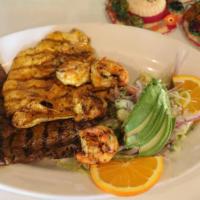 Typical 3 Friends · Grilled chicken, beef and shrimp served with rice, beans and salad.