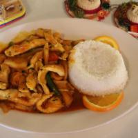 Sauteed Chicken With Onions, Tomatoes & Peppers · Served with rice and french fries.