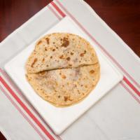 Baleadas Regulares / Honduran Style Flour Tortilla · (Con frijoles, queso y crema) /  (Filed with beans, cheese and cream