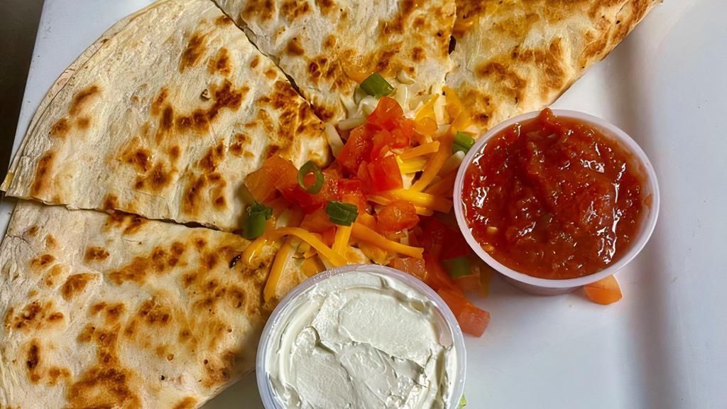 Quesadilla · Melted cheddar-jack, tomatoes, scallions, salsa & sour cream