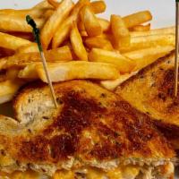 Tuna Melt · House made tuna salad with cheddar cheese on toasted rye bread, comes with your choice of a ...