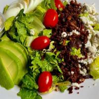 Cobb Salad · Romaine, crumbly bleu, bacon, tomatoes, egg & avocado with Balsamic