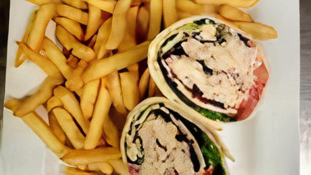 Chicken Salad Wrap · Housemade chicken salad, pepper-jack, lettuce, tomato, bacon & cranberries