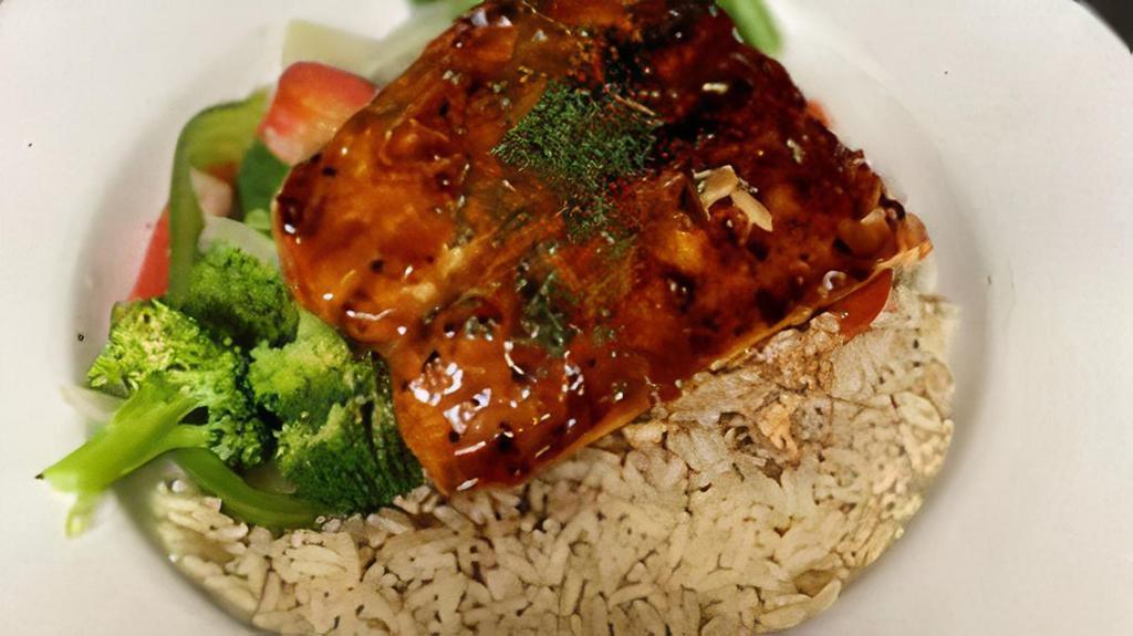 Teriyaki Salmon Dinner · Fresh salmon with a teriyaki glaze over seasoned rice & vegetables