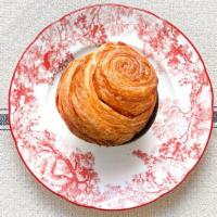 Rouleau Du Matin · Flaky spiral croissant dough covered with cinnamon and brown sugar — Baked fresh each morning.