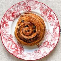 Pain Aux Raisins · Spiral pastry with raisins and crème pâtissière filling — Baked fresh each morning.