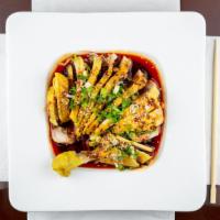 Steamed Chicken With Chilli Sauce 口水鸡 · Hot and spicy.